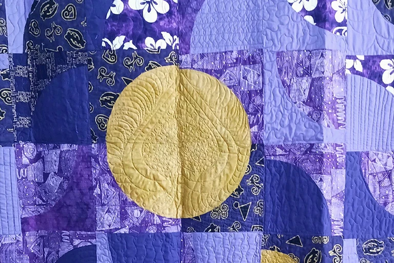 A Purple Patchwork Sewn in Sisterhood Exhibit